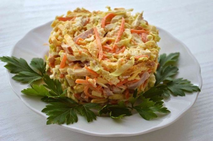 Salad with Chinese cabbage, egg pancakes and ham