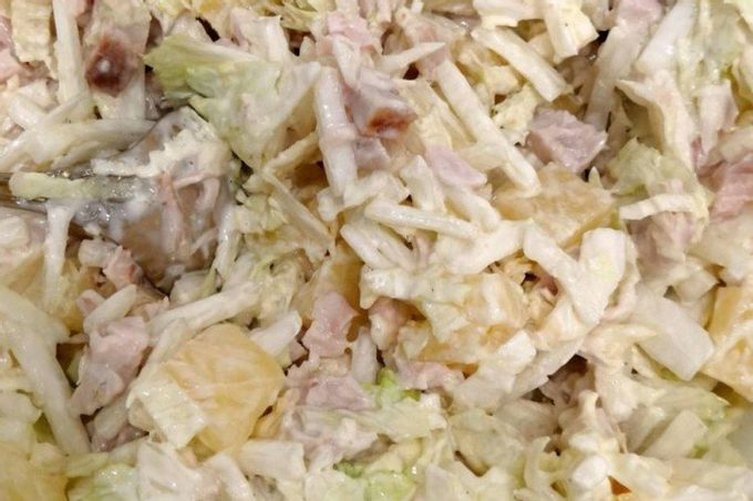 Salad with Beijing cabbage, smoked chicken, pineapple and cheese