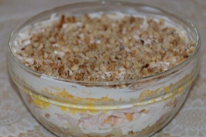 Puff salad with plmarinated cheese, smoked chicken and pineapple