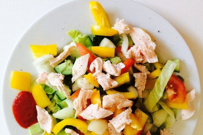 Vegetable salad with pineapple and smoked chicken