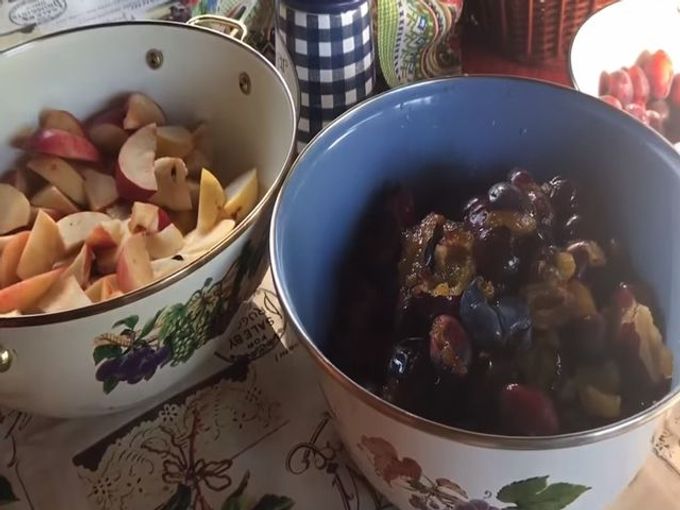 cut apples and pitted plums